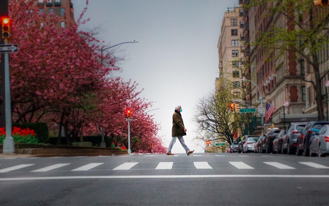 covid-19-lockdown-crossing-street-clay-leconey-Q1qkCeCU6dE-unsplash