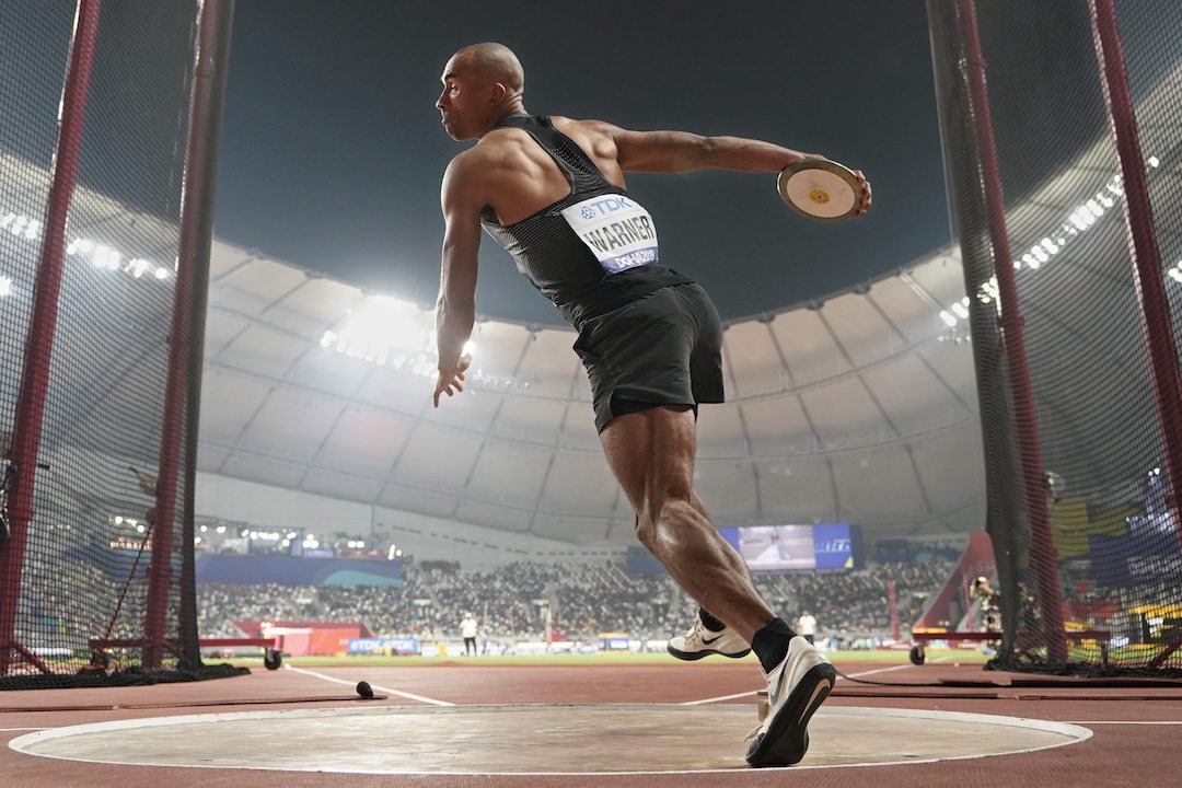 Damian Warner, of Canada, competes in the men's decathlon discus throw at the World Athletics Championships in Doha, Qatar, Thursday, Oct. 3, 2019. (AP Photo/David J. Phillip)